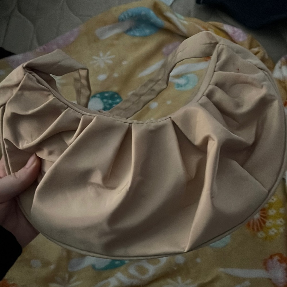 crème 90s style runched purse